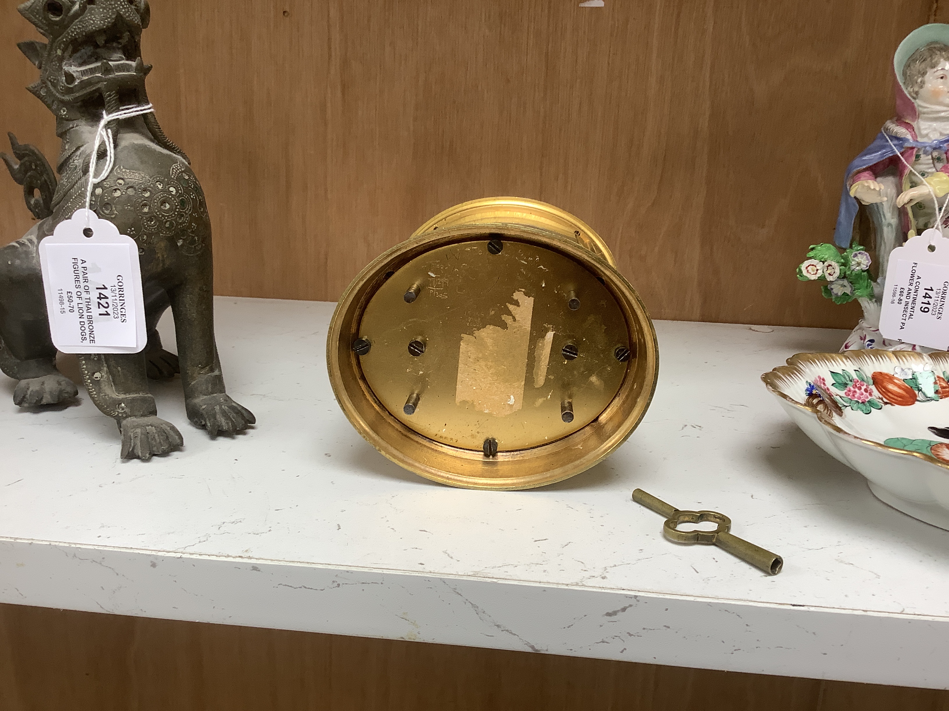 A Drocourt hour-repeating oval carriage clock, striking on a coiled gong, 13cm